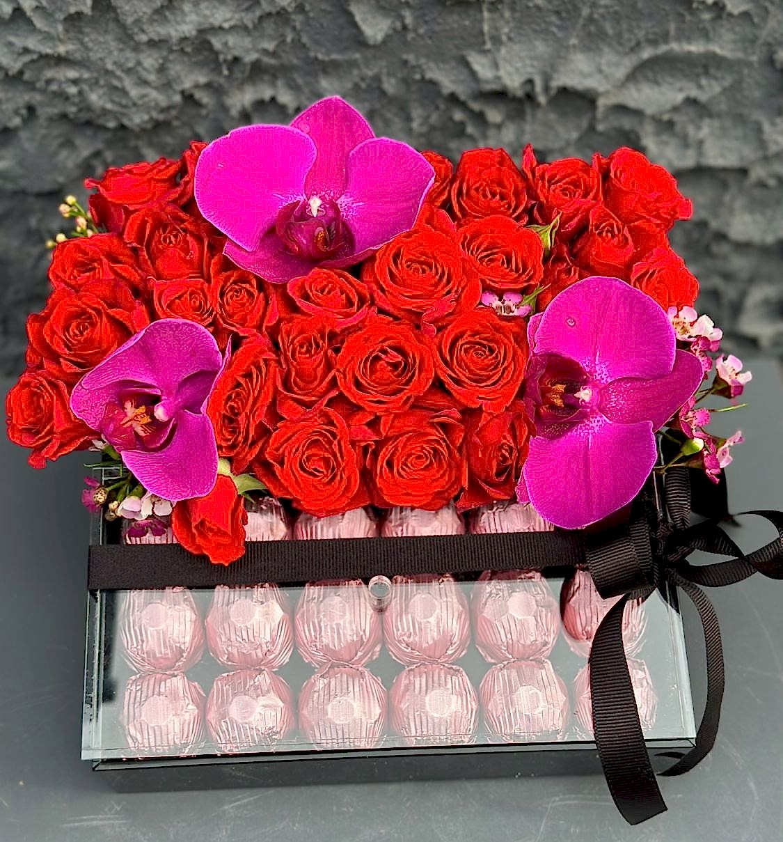 Box of red roses and chocolates